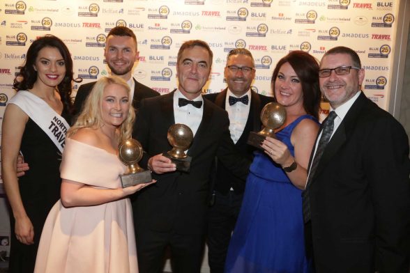 FLYING HIGH: Package holiday specialist scores hat-trick at the 25th annual Blue Insurance Northern Ireland Travel and Tourism Awards. Pictured (l-r) Nikki Porter, Simon Marshall, James Nesbitt, Craig Davidson, Helen Parry and Alan Cross.